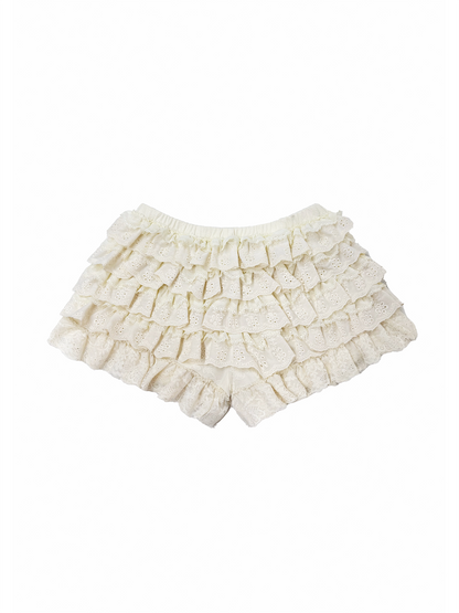 Cream ruffled lace shorts with a tiered design and elastic waistband, photographed flat on a white background.