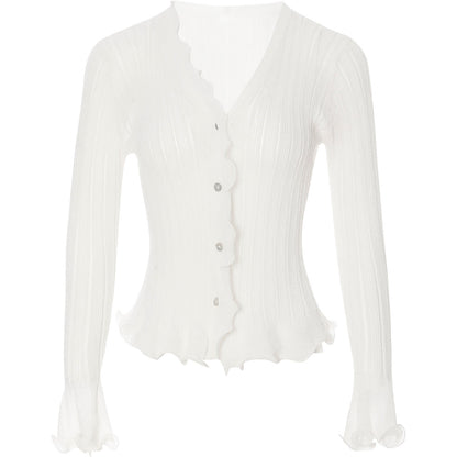 White blouse with ruffled details on a white background