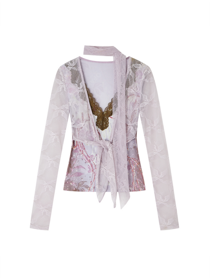 A light pink and white floral lace long-sleeve cardigan with a butterfly applique at the center front and a matching neck tie, displayed on a clean white background.
