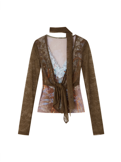 A women's long-sleeve top featuring a sheer brown mesh fabric with a subtle abstract print, layered over a white lace V-neck bodysuit. The top has a unique cutout collar with a tie strap and a tie-front waist detail.