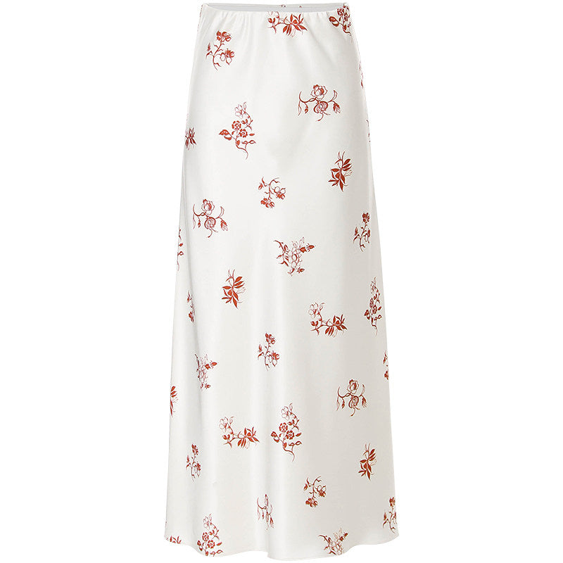 White skirt with red floral pattern on a white background