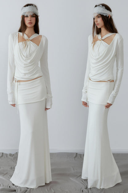 Two identical outfits worn by a model against a white background