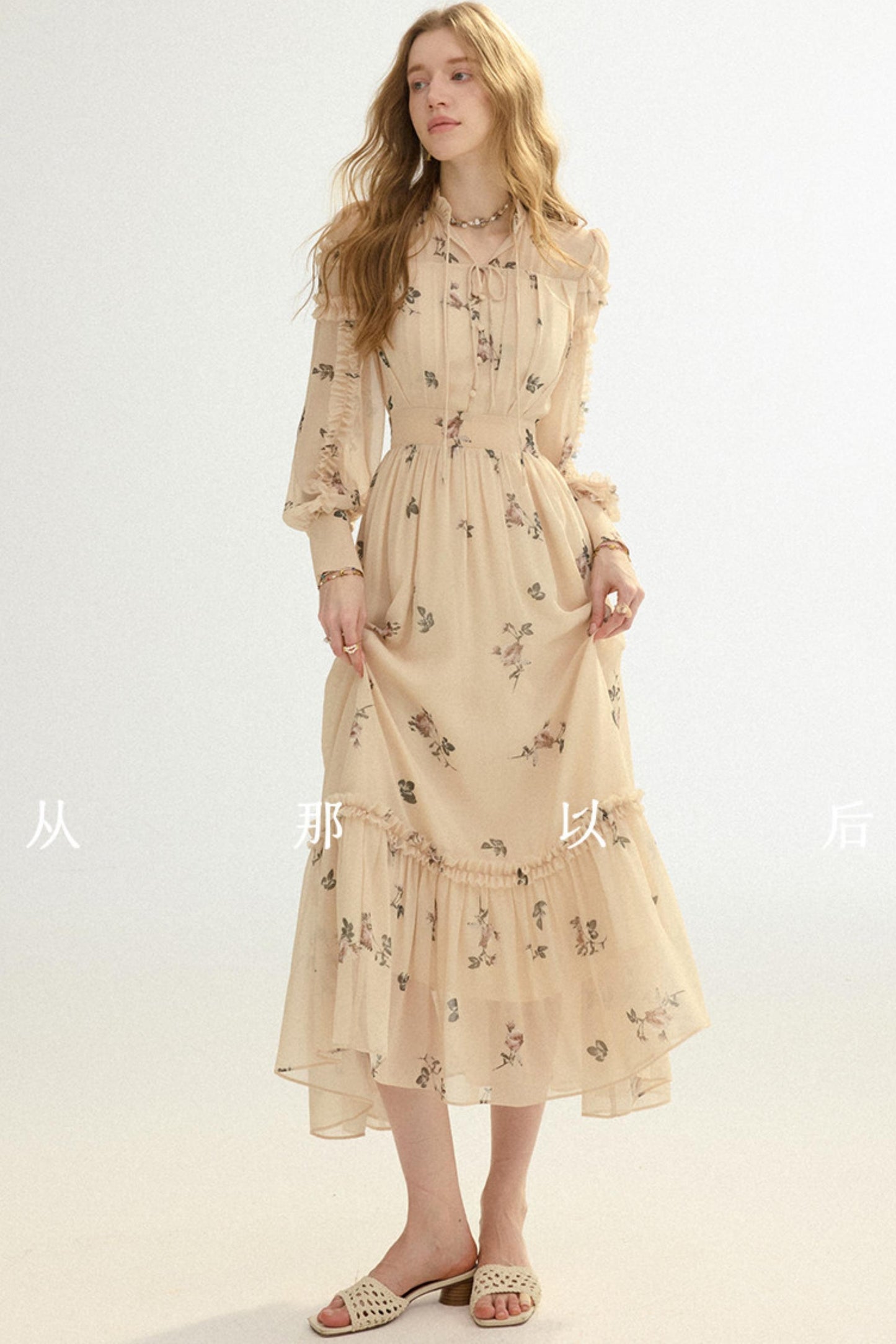 Woman wearing a beige floral dress on a white background