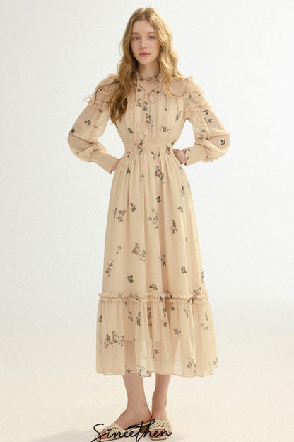 Woman wearing a beige floral dress on a white background