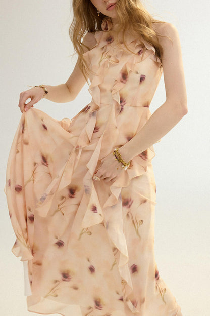 Woman wearing a floral dress with a plain background
