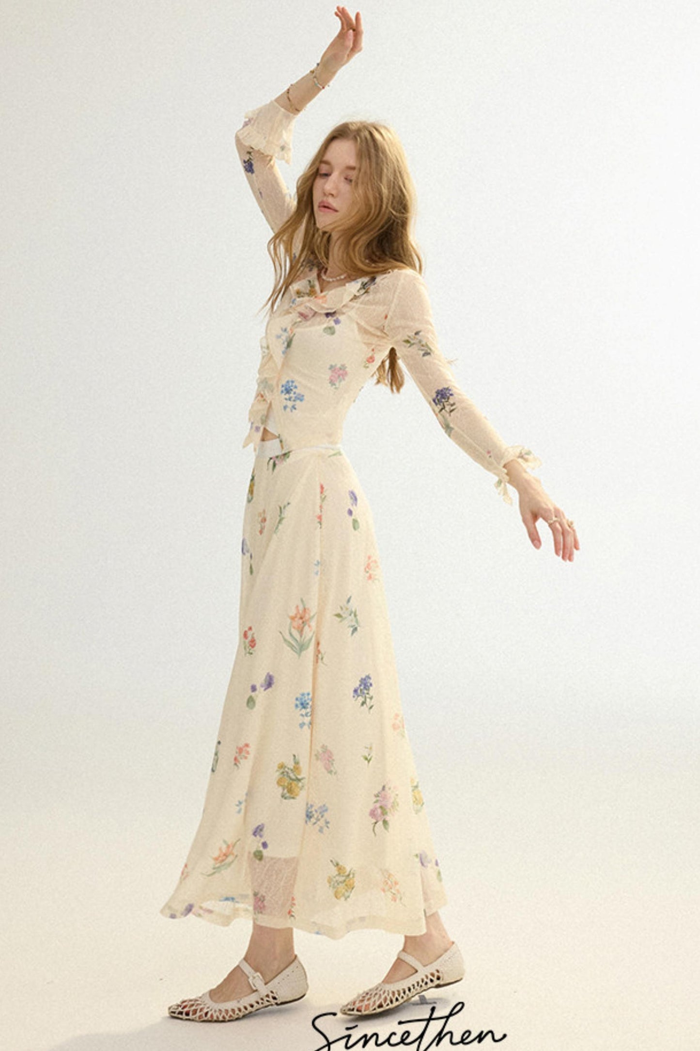 Woman wearing a floral dress on a white background