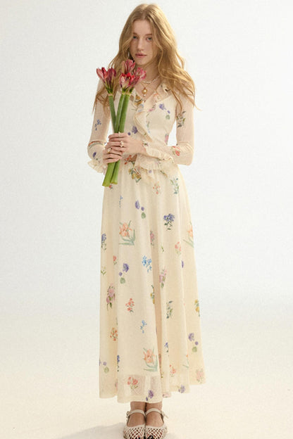 Woman in a floral dress holding tulips against a white background