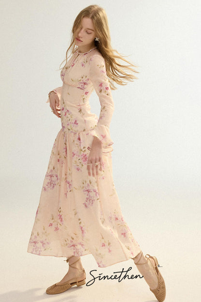Woman wearing a floral dress with a plain background