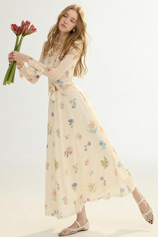 Woman in a floral dress holding tulips against a white background